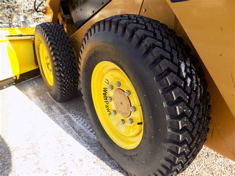 snow wolf skid steer tires|skid steer snow tires.